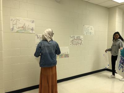 Students posting Posters